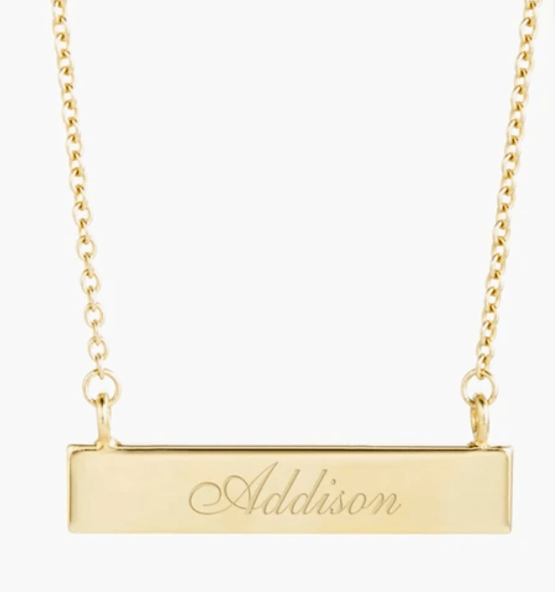 10 perfect Gifts for the Women in your Life. Gold bar name necklace.